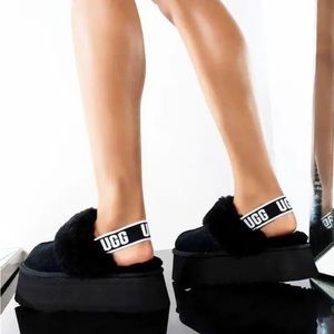 NWT (in box)  -UGG "FUNKETTE" PLATFORM SLIPPERS IN BLACK SUEDE SIZE 9